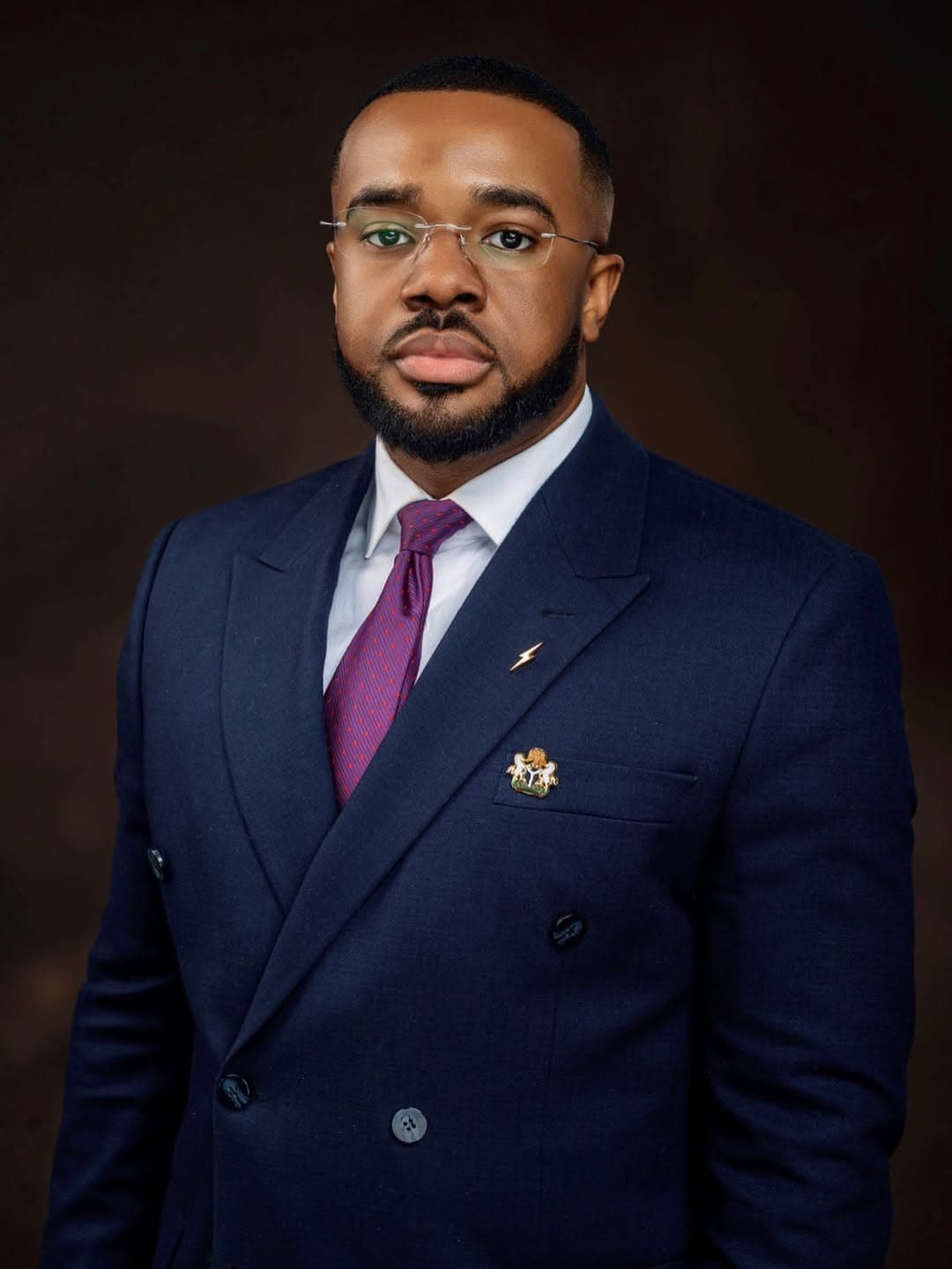 Williams Uchembah in navy suit